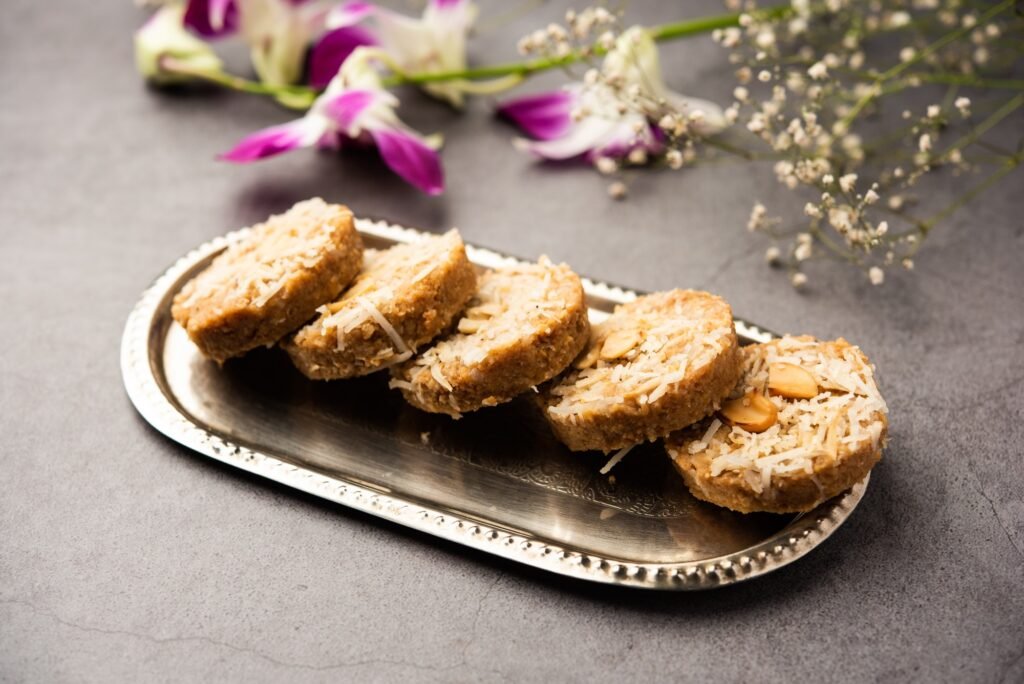 Amrit peda or Amrut pedha or pera is an Indian sweet made from milk and sugar with coconut topping